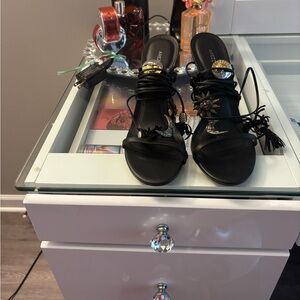 Elegant Black Heels with Gold Accents